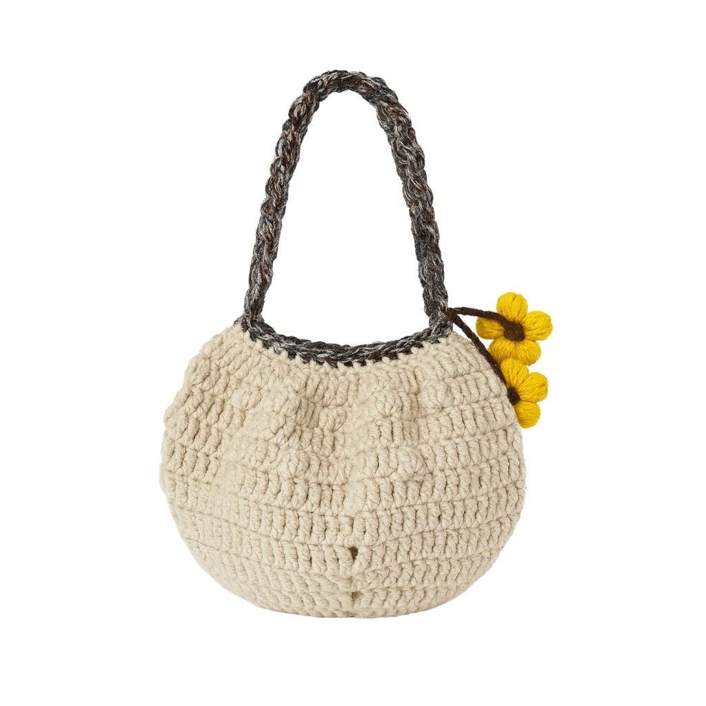 Handmade crochet pebble stitch bag styled display | Unique Treasures